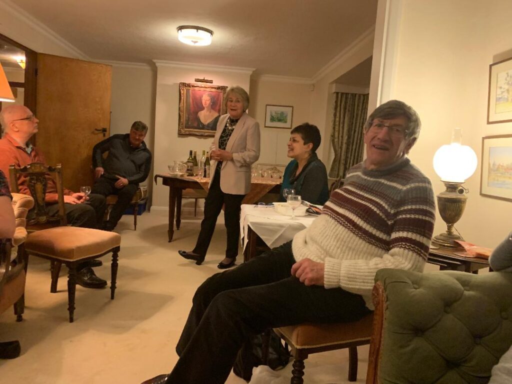 Chair addressing wine buffs